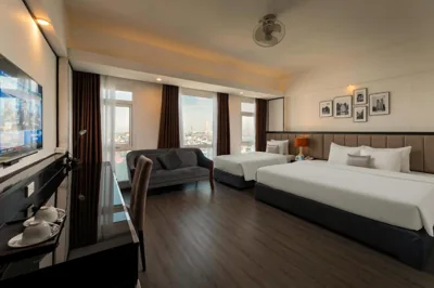 Deluxe Triple Room with City View — Ja Cosmo Hotel and Spa